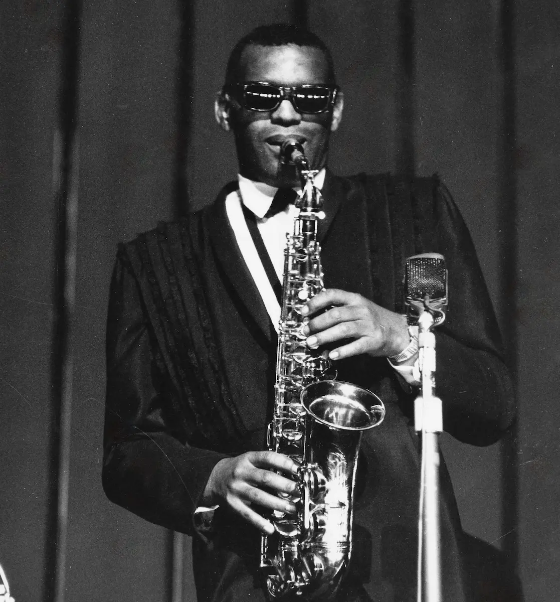 The Legacy of Mid-Century Mastery: Ray Charles, Clifford Brown, and John Lee Hooker